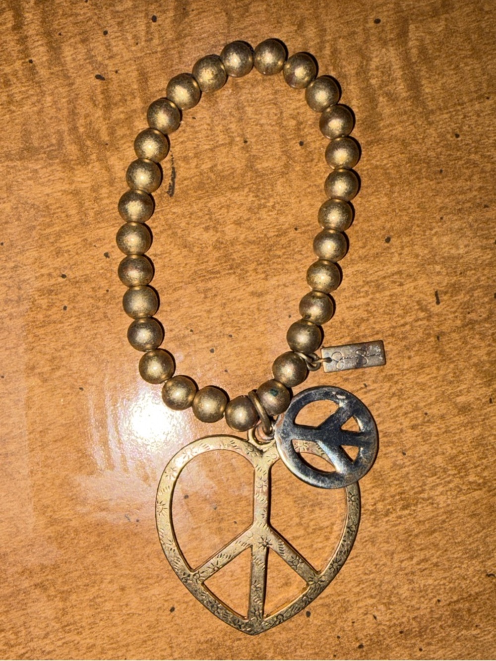 Jessica Simpson Brass Tone Peace Heart Charm Bracelet - Women bracelet